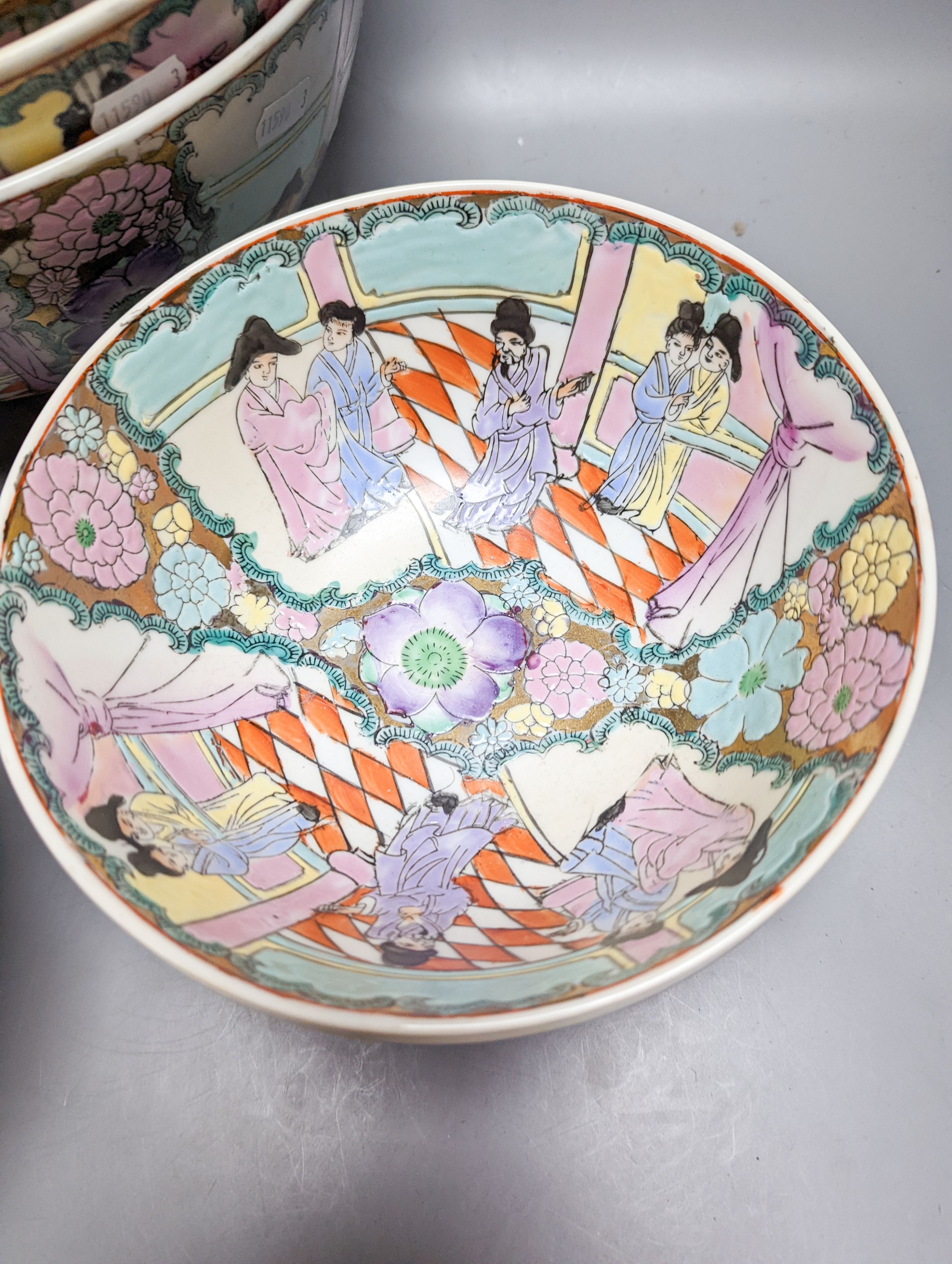A set of six Chinese famille rose graduated bowls and a scroll picture